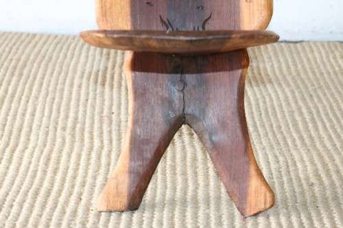 An amazing Blackwood African "birthing" chair with stunning hand carved detailing - practical!