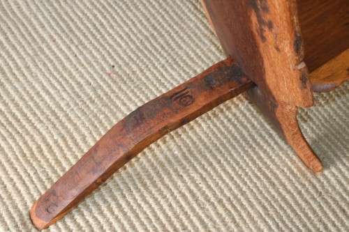 An amazing Blackwood African "birthing" chair with stunning hand carved detailing - practical!