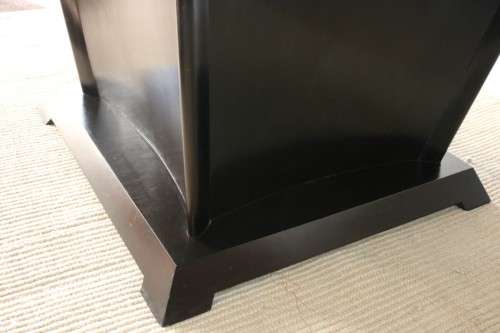 An awesome oval ebony-stained Oak-finished boardroom/ dining table with modern styling