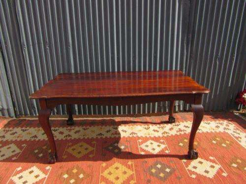 An amazing vintage Imbuia dining table with oversized ball and claw feet in wonderful condition