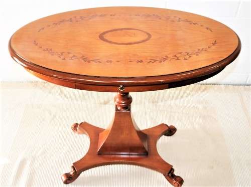 A fantastic Italian oval occasional/ sewing table with wonderful floral marquetry inlay detailing