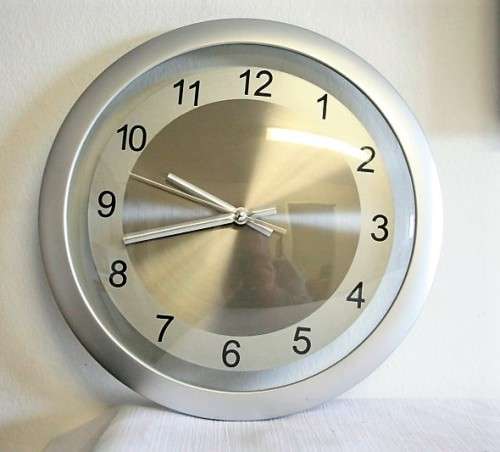 A stunning modern styled quartz clock in a brushed steel & polished steel combination look - RS17CL