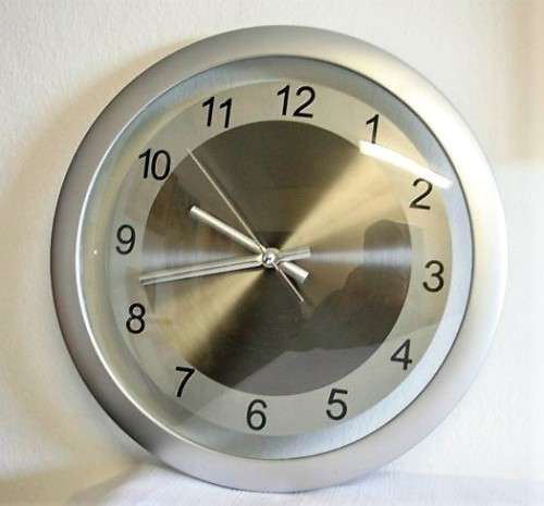 A stunning modern styled quartz clock in a brushed steel & polished steel combination look - RS17CL