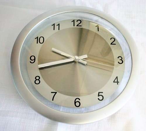 A stunning modern styled quartz clock in a brushed steel & polished steel combination look - RS17CL