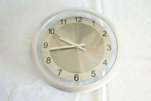 A stunning modern styled quartz clock in a brushed steel & polished steel combination look - RS17CL