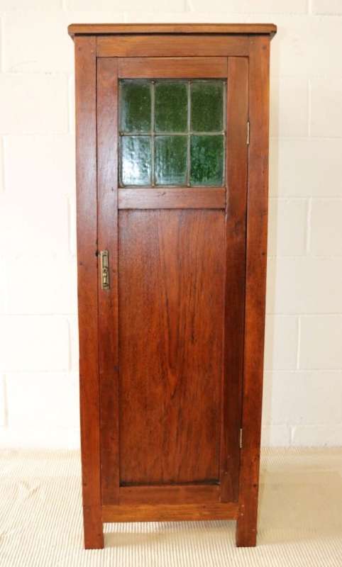 Awesome solid Teak pedestal cabinet with incredible stained glass panels and ornate handle!