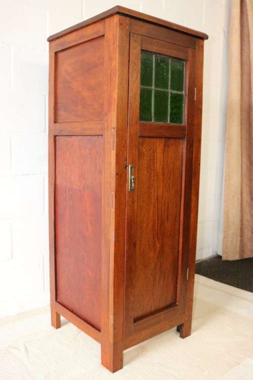 Awesome solid Teak pedestal cabinet with incredible stained glass panels and ornate handle!