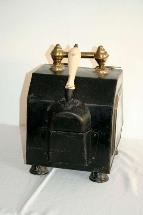 **RS17** An antique tole metal coal box w/ incredible brass embossed embellishments & a scoop