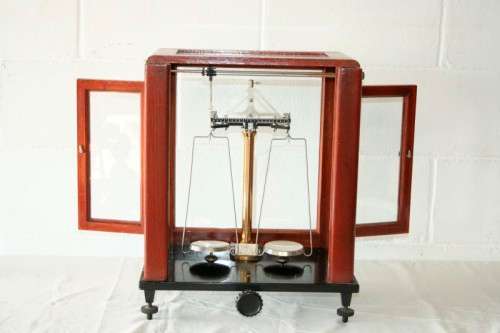 An exceptionally rare antique "Apothecary" scale in its original glass and Mahogany wood case