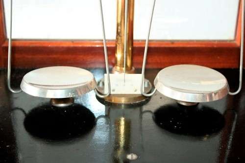 An exceptionally rare antique "Apothecary" scale in its original glass and Mahogany wood case
