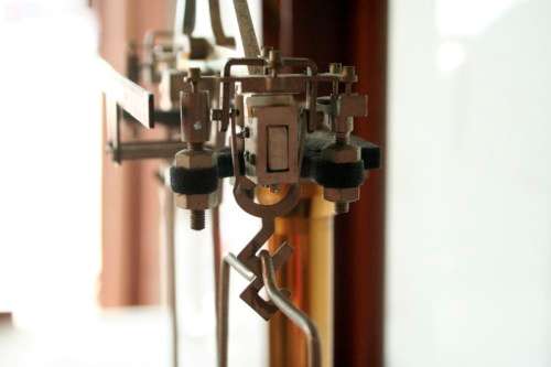 An exceptionally rare antique "Apothecary" scale in its original glass and Mahogany wood case