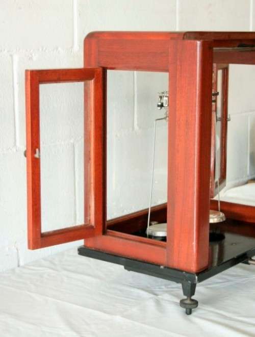 An exceptionally rare antique "Apothecary" scale in its original glass and Mahogany wood case