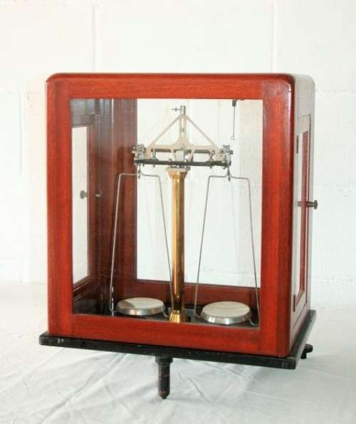 An exceptionally rare antique "Apothecary" scale in its original glass and Mahogany wood case
