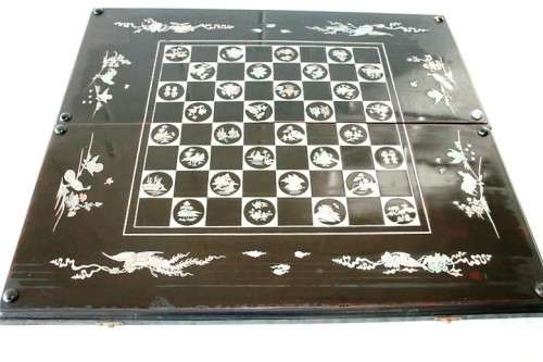 **RS17** A Vietnamese black-lacquered chess & backgammon board w/ mother of pearl inlay