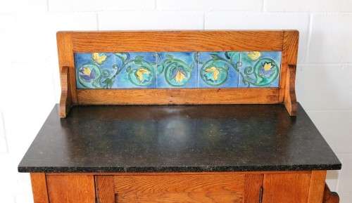 A wonderful vintage solid Oak wash stand with a black marble top and tiled splash back - stunning!
