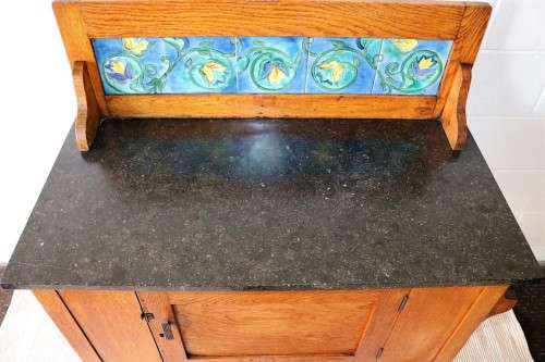 A wonderful vintage solid Oak wash stand with a black marble top and tiled splash back - stunning!