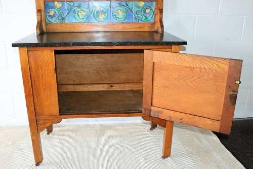 A wonderful vintage solid Oak wash stand with a black marble top and tiled splash back - stunning!