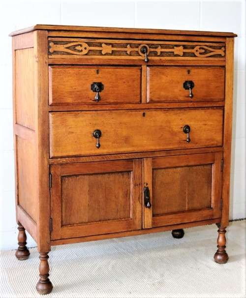 A wonderful vintage four-drawer "Belweb" Oak tallboy chest of drawers w/ ornate carvings - awesome!