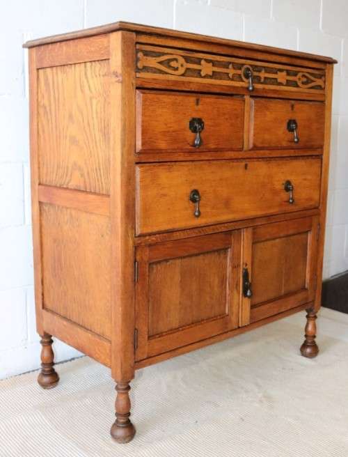 A wonderful vintage four-drawer "Belweb" Oak tallboy chest of drawers w/ ornate carvings - awesome!