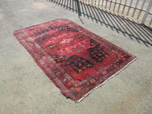 A wonderful vintage Persian Carpet (2.3m x 1.4m) in deep red, black and rust colours - stunning!