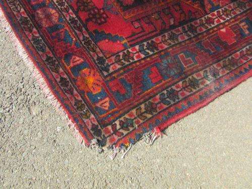 A wonderful vintage Persian Carpet (2.3m x 1.4m) in deep red, black and rust colours - stunning!