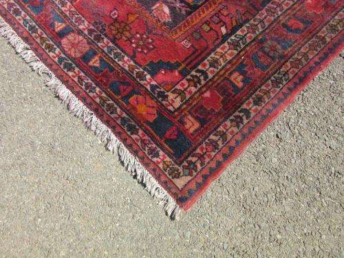 A wonderful vintage Persian Carpet (2.3m x 1.4m) in deep red, black and rust colours - stunning!