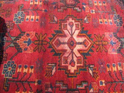 A wonderful vintage Persian Carpet (2.3m x 1.4m) in deep red, black and rust colours - stunning!