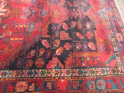 A wonderful vintage Persian Carpet (2.3m x 1.4m) in deep red, black and rust colours - stunning!