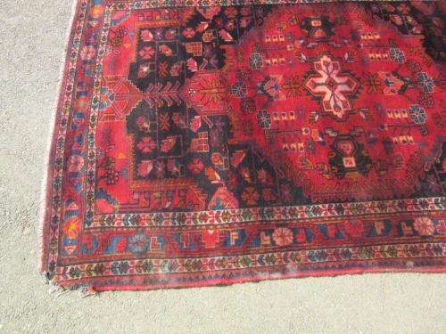 A wonderful vintage Persian Carpet (2.3m x 1.4m) in deep red, black and rust colours - stunning!
