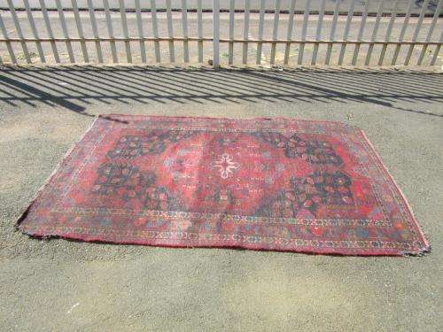 A wonderful vintage Persian Carpet (2.3m x 1.4m) in deep red, black and rust colours - stunning!
