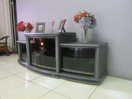 Stylish plasma unit w/ space for an entertainment centre, great in any living/ family room; RS17Sale