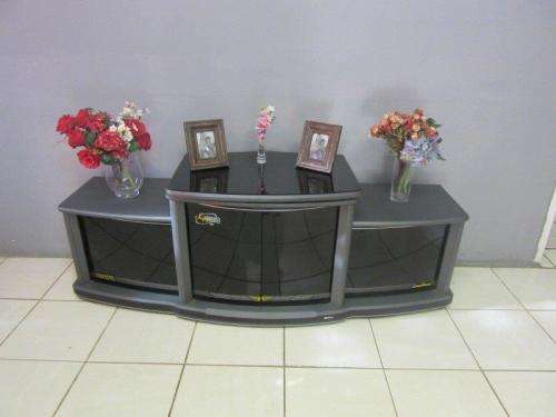 Stylish plasma unit w/ space for an entertainment centre, great in any living/ family room; RS17Sale