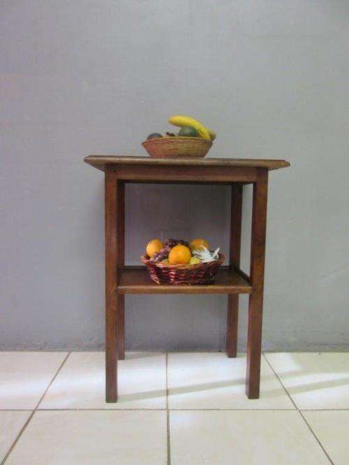 A wonderful vintage solid Teak occasional table with two levels in great condition