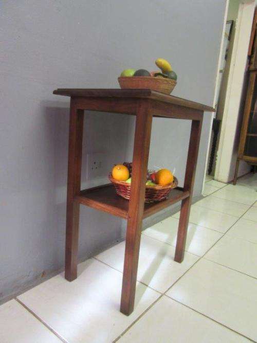 A wonderful vintage solid Teak occasional table with two levels in great condition