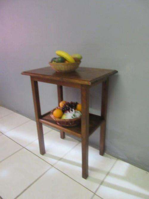 A wonderful vintage solid Teak occasional table with two levels in great condition