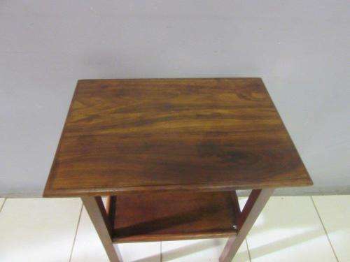 A wonderful vintage solid Teak occasional table with two levels in great condition