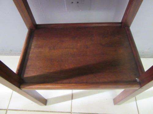 A wonderful vintage solid Teak occasional table with two levels in great condition