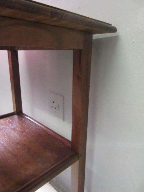 A wonderful vintage solid Teak occasional table with two levels in great condition