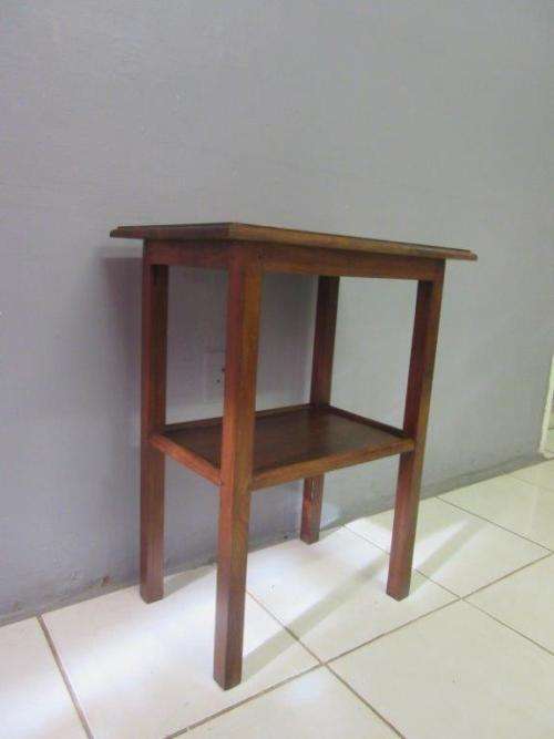 A wonderful vintage solid Teak occasional table with two levels in great condition