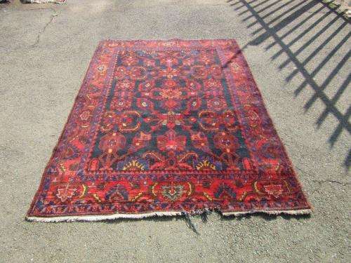An amazing vintage Persian Carpet (1.9m x 1.4m) in deep red, blue and black detailing - wow!