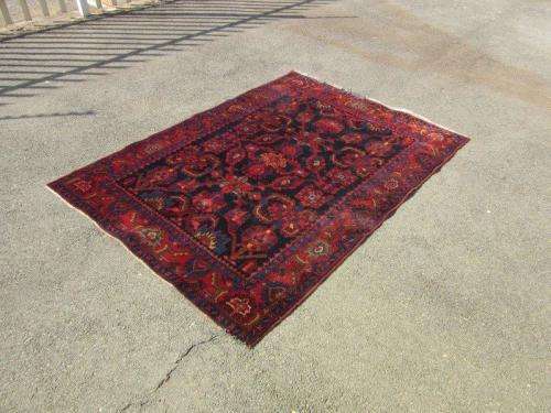An amazing vintage Persian Carpet (1.9m x 1.4m) in deep red, blue and black detailing - wow!
