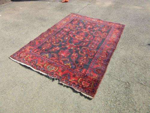 An amazing vintage Persian Carpet (1.9m x 1.4m) in deep red, blue and black detailing - wow!