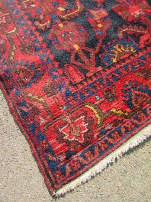 An amazing vintage Persian Carpet (1.9m x 1.4m) in deep red, blue and black detailing - wow!