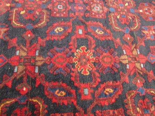 An amazing vintage Persian Carpet (1.9m x 1.4m) in deep red, blue and black detailing - wow!