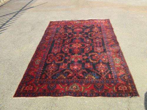 An amazing vintage Persian Carpet (1.9m x 1.4m) in deep red, blue and black detailing - wow!