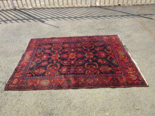 An amazing vintage Persian Carpet (1.9m x 1.4m) in deep red, blue and black detailing - wow!