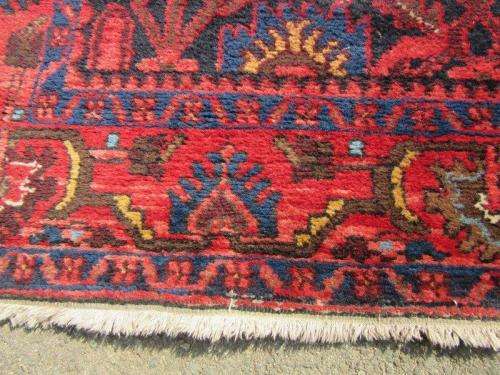 An amazing vintage Persian Carpet (1.9m x 1.4m) in deep red, blue and black detailing - wow!