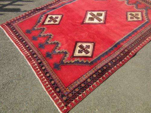 A magnificent vintage Iranian "Sirjani" Bokhtiari Kilim Persian carpet in vibrant red, blues, cream