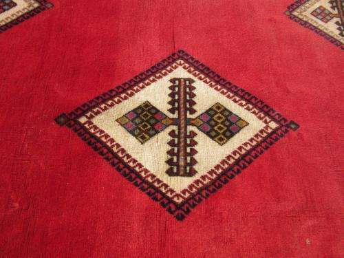 A magnificent vintage Iranian "Sirjani" Bokhtiari Kilim Persian carpet in vibrant red, blues, cream