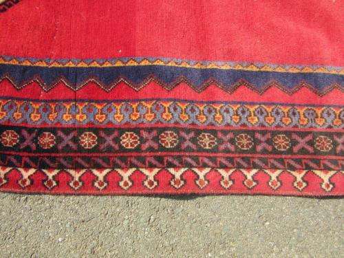 A magnificent vintage Iranian "Sirjani" Bokhtiari Kilim Persian carpet in vibrant red, blues, cream
